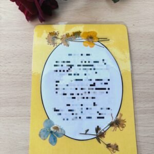 Tarjeta floral plastificada