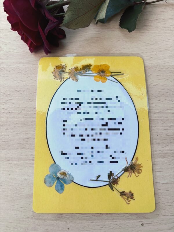 Tarjeta floral plastificada